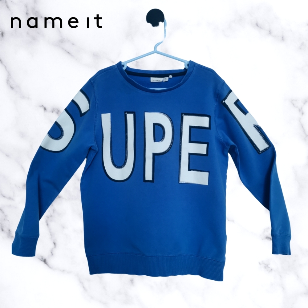 name it sweater